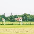 Piłkochwyty sportowe o wysokości 6 metrów z zielonymi słupami // Piłkochwyty